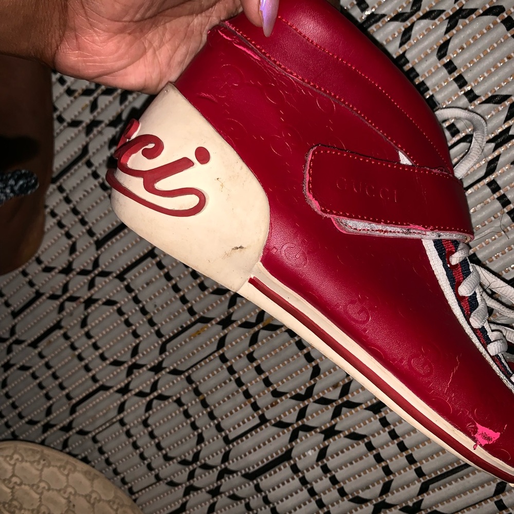 Red leather Gucci sneakers
